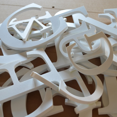 Буквы из белого пластика